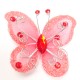 Letterlijk en figuurlijk schitterende organza vlinder met metaaldraad langs de randen koraal rood