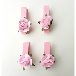 Pak met 4 roze knijpertjes met roosje