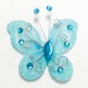 Letterlijk en figuurlijk schitterende organza vlinder met metaaldraad langs de randen turquoise